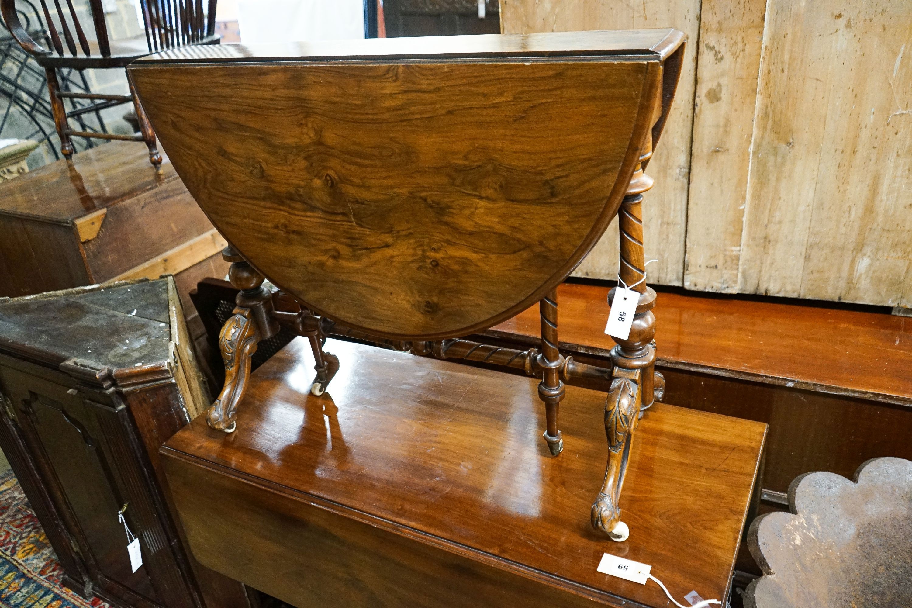 A Victorian walnut Sutherland table, width 90cm, height 71cm